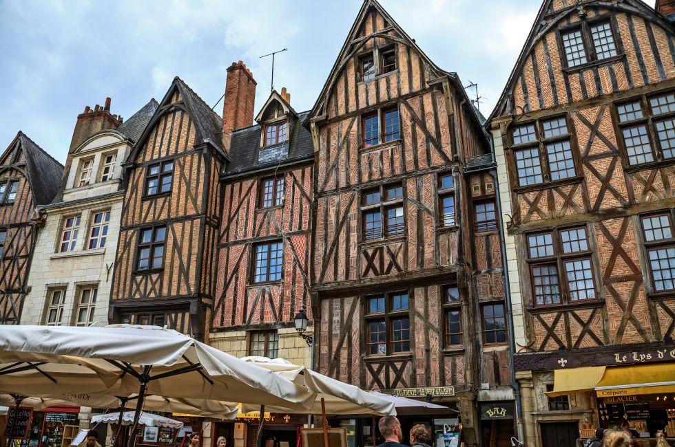 TOURS - JUNE 12: Half-timbered houses dating from the XV century on Plumereau Square, famous of bustling weekly markets and fairs in Tours, France on June 12, 2012; 