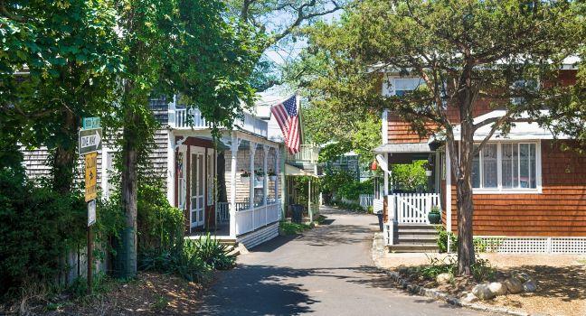 Narrow streets and quaint cottages in Oak Bluffs on June 26, 2011. Oak Bluffs on Martha&#x2019;s Vineyard is popular for the historic gingerbread style homes located there.