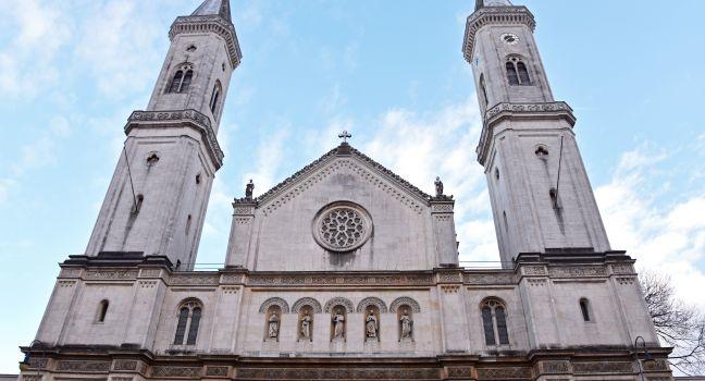 The Catholic Parish and University Church St. Louis, called Ludwigskirche, in Munich is a monumental church in neo-romanesque style with the second-largest altar fresco of the world.