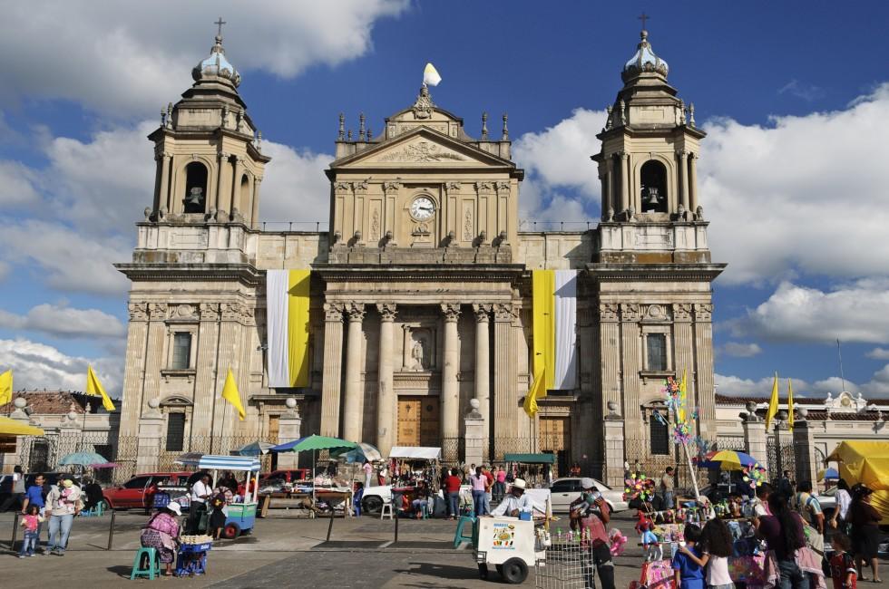 GUATEMALA CITY, GUATEMALA-JAN 3: Activity in front of the Guatemala Metropolitan Cathedral in Plaza Mayor on Jan 3, 2012.  This is the main church of Guatemala City and of the Archdiocese of Guatemala.