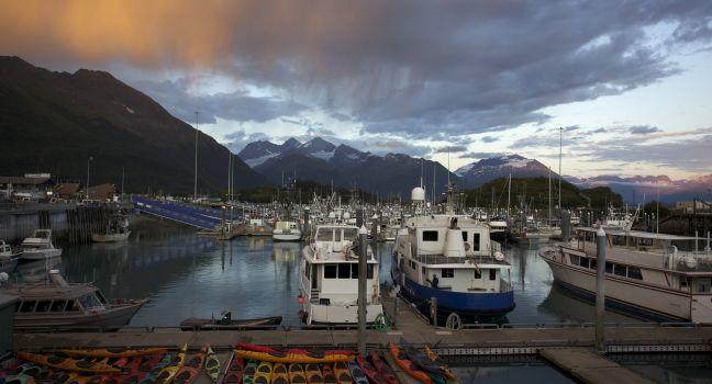 Sunset in harbor of Valdez Alaska.