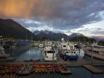 Sunset in harbor of Valdez Alaska.