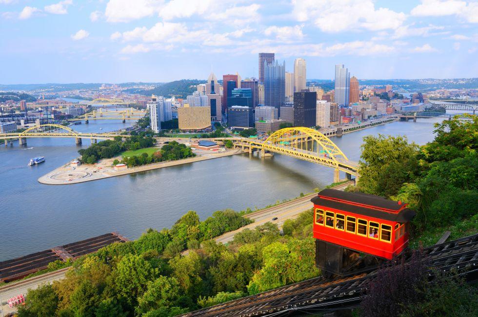 Incline operating in front of the downtown skyline of Pittsburgh, Pennsylvania, USA