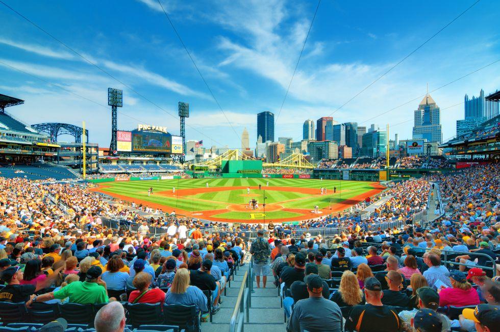 Pirates play the Arizona Diamond Backs at PNC Stadium with the central business district in the the background.