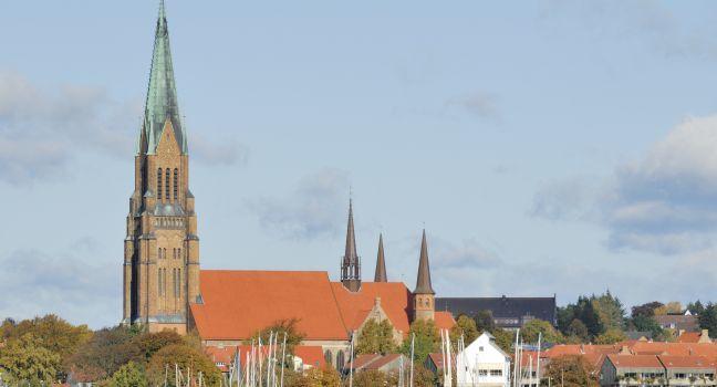 The Schleswig Cathedral Schleswig Germany seen from across the Firth.