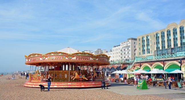 Brighton, United Kingdom - September 28, 2014: Carousel on the beach on a Summer day at Brighton on the south coast of England.