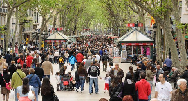 People walk by at the famous La Rambla in Barcelona, Spain.