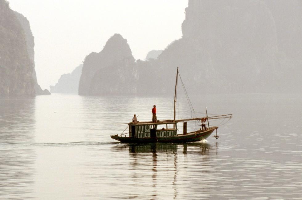 Sailing through limestone karst at Halong Bay, Southeast Asia, Vietnam